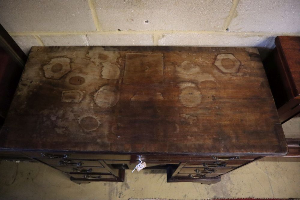 A George III walnut kneehole desk, width 90cm, depth 42cm, height 86cm